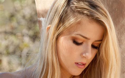 Stunning young blond babe Abigaile Johnson strips .
